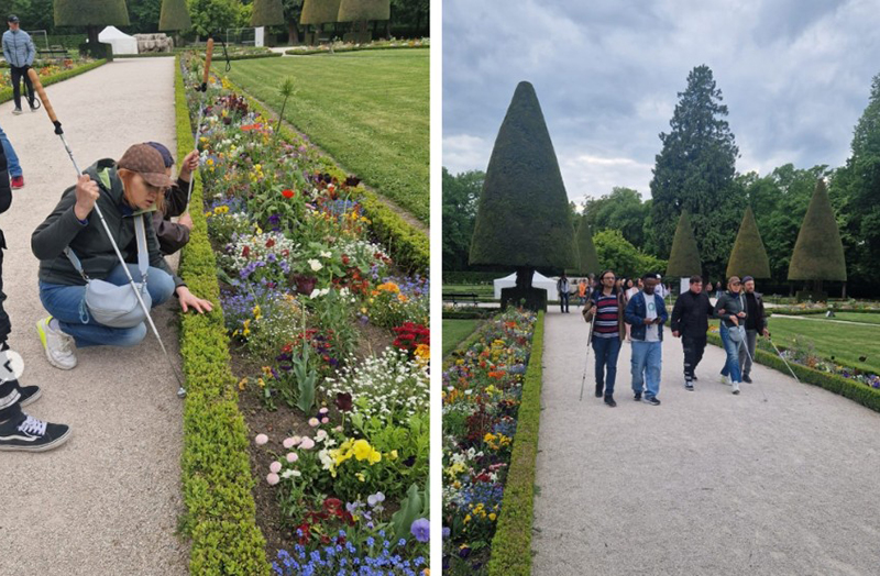 Ausflugsteilnehmende beim Rundgang durch den Hofgarten